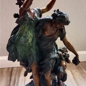 Elegant Bronze Sculpture with Green and Brown Accents